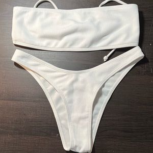 Super cute swimsuit high cut bottoms with lace up top